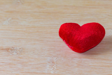 Obraz premium Red heart on the wooden floor For Valentine's Day