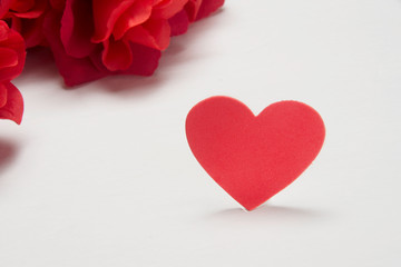 Roses for romance with a red heart for the valentines celebration