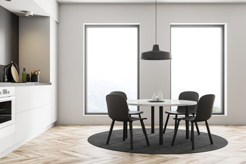 White loft kitchen interior with table