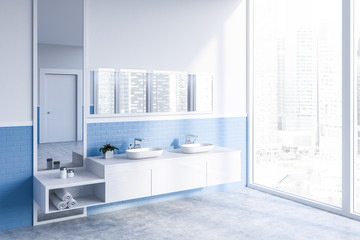 Fototapeta na wymiar White and blue bathroom corner, double sink