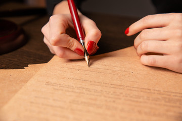 Notary's public pen and stamp on testament and last will. Notary public tools