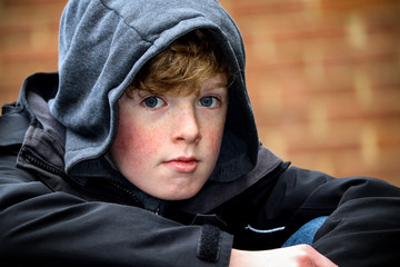 Young boy in hood