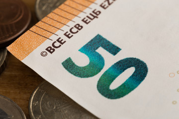 50 euro notes and coins- Image.