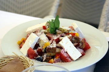 Traditional greek salad served in a restaurant in Thessaloniki, Greece