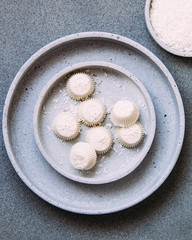 white chocolate vegan pralines or candy with coconut