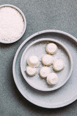 white chocolate vegan pralines or candy with coconut