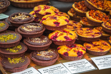 Assortment of sweet tarts on display at Broadway Market in Hackney, East London