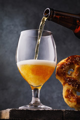 Process of pouring fresh light beer in a glass