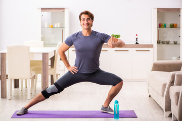 Man exercising for knee injury recovery