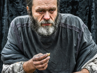 Homeless man crying portrait closeup