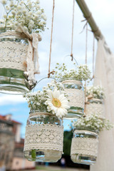 Decorative flowers in bulbs hung in a wedding party