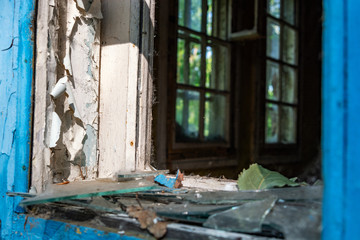 Image in the form of an old window with broken windows