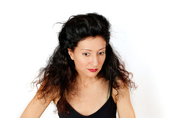 Fototapeta premium Disheveled attractive young woman on white background