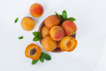 Couple of apricots in a bowl