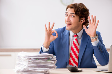 Deaf employee using hearing aid in office