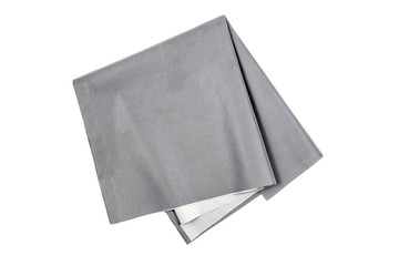 Reflective fabric illuminates in dark, light bounces back from fabric surface, isolated on white.