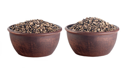 thistle seeds in pottery isolated on white background, set of two images