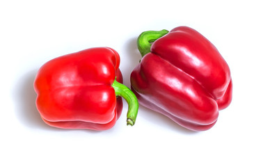 Two sweet bell peppers isolated on white background .