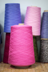 yarn on cardboard cones for use in knitting and clothing industry
