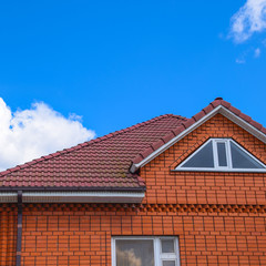 The house with a roof of classic tiles