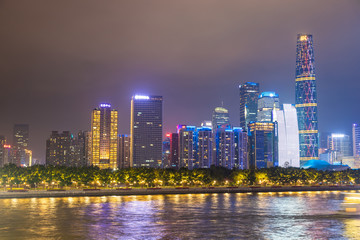 Fototapeta na wymiar Zhujiang river and modern building of financial district at night in Guangzhou, China.