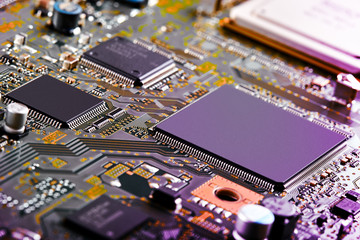 Electronic circuit board close up.