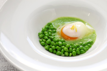 tear peas with poached egg, spanish basque cuisine