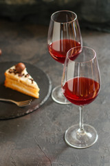 red wine, cake and macaroons, dessert (sweets). food background. top photo