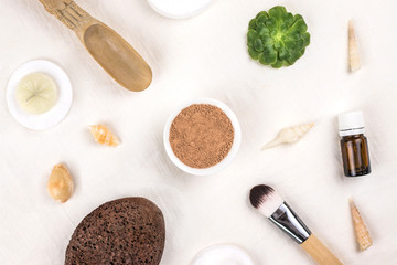 Clay mineral facial water and cosmetic tools.