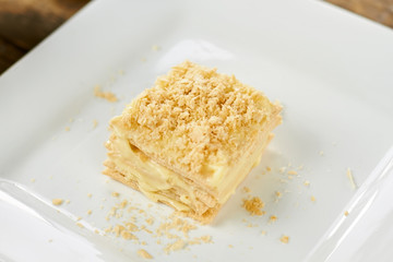 Creamy layer cake napoleon. Portion of napoleon.