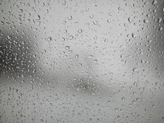 Water drops on  a car window glass