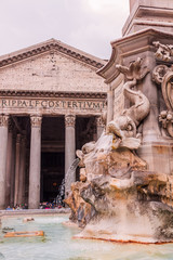 Roman temple Pantheon view with a fountain, Italy