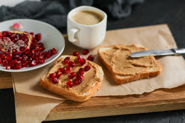 sandwich, pomegranate, peanut butter (sweet snack). Top Food background