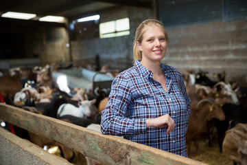 Positive woman owner of dairy farm
