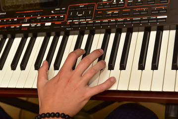 hands of musician playing keyboard ,Artist hands of a piano player