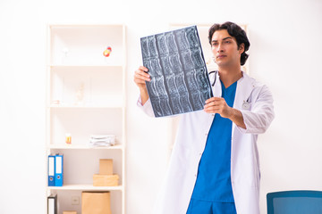 Young male doctor radiologist working at the clinic