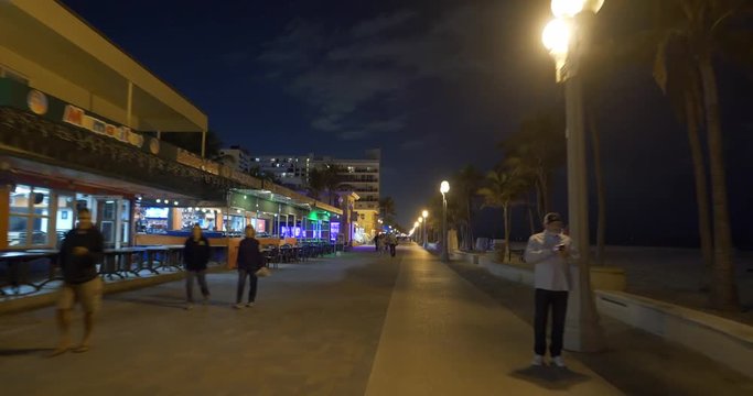 Motion video Hollywood Beach Boardwalk at night 4k