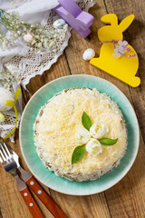 Festive snack on Easter table. Salad with eggs, chicken, mushrooms and cheese. Top view flat lay background.