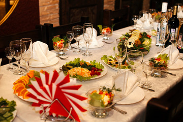 Normal russian or ukranian celebration feast table on banquet