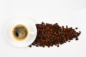 Cup of coffee and coffee beans.