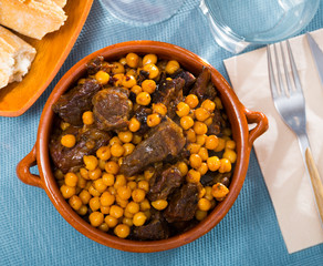 Tasty beef stew with chickpeas closeup