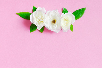 Soft background with arrangement of white roses flowers