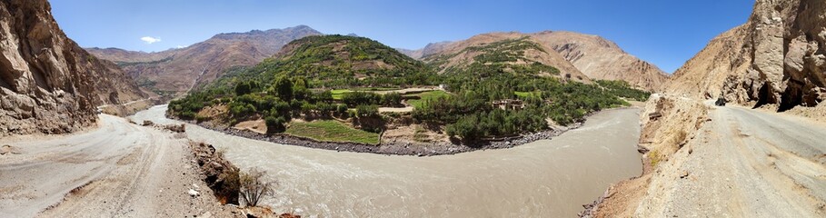Fototapeta na wymiar Panj or Amu Daria river and Pamir mountains Tajikistan
