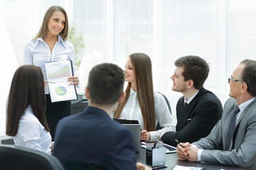 business woman conducting a presentation for business colleagues