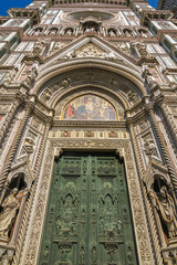 View on the main entrence of the Cathedral of Santa Maria in Florence, Italy on a sunny day.