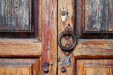 Fototapeta na wymiar wooden door with lock and knocker