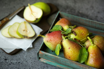 Ripe juicy pears in a basket