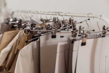 New sketches of a new collection for women being presented in a showroom