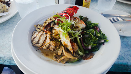 chicken salad with vegetables for breakfast toppings of tomatoes