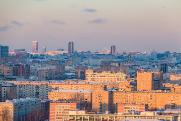 Panorama of Moscow at sunset. City skyline on winter day.